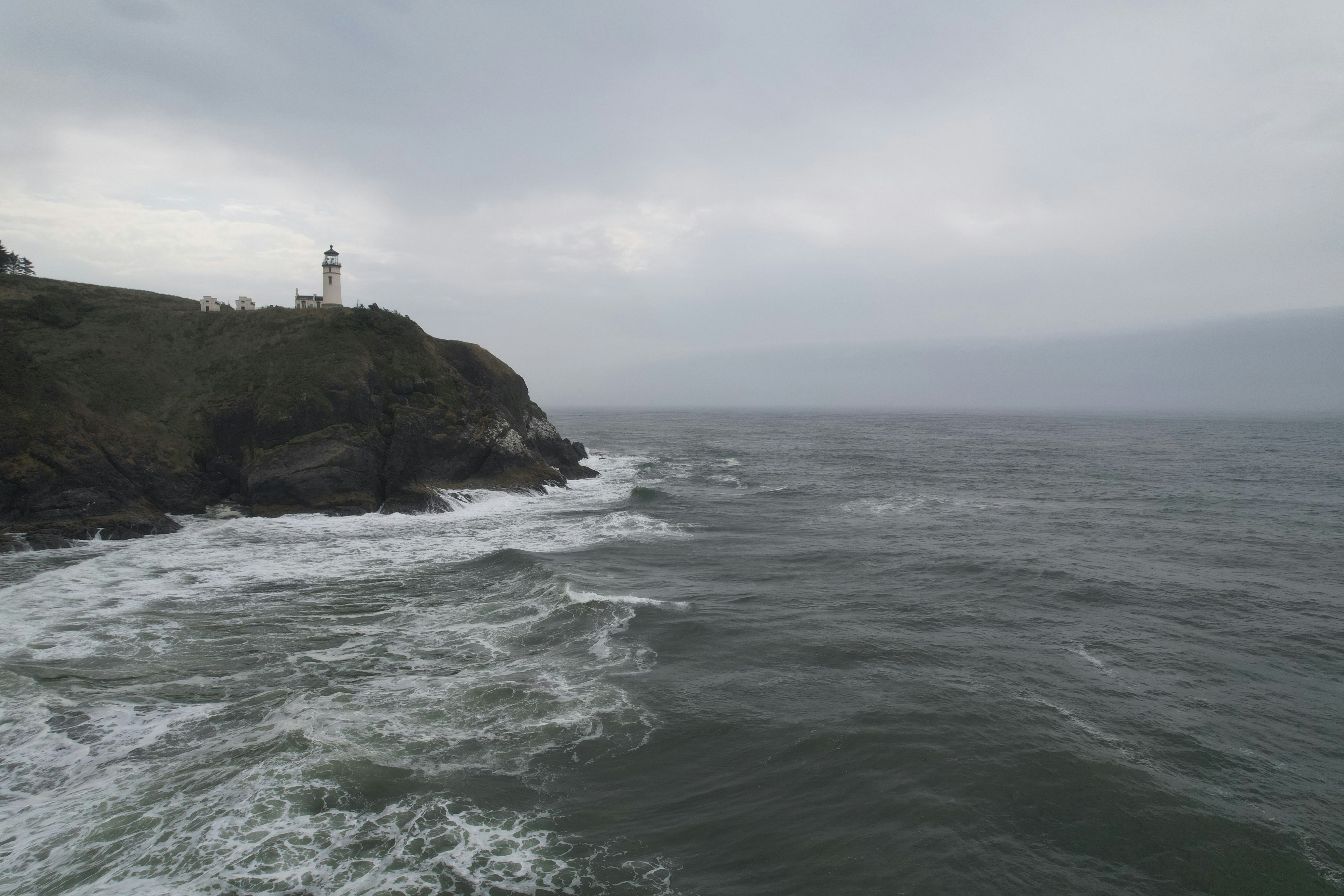 a lighthouse on a rocky island