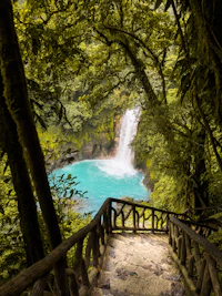a bridge over a waterfall