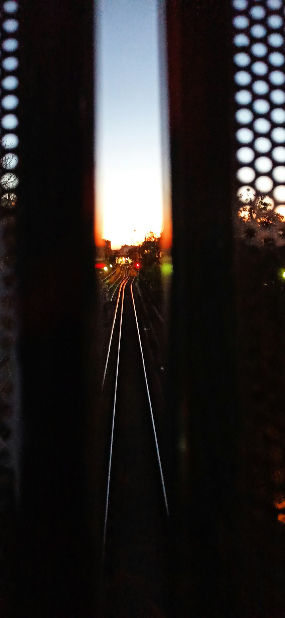 a view of a street through a window