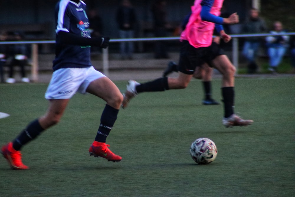 a group of people playing football