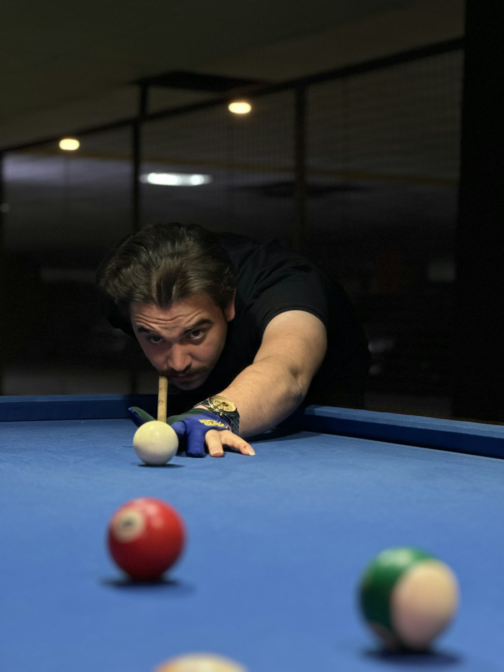 a person playing pool