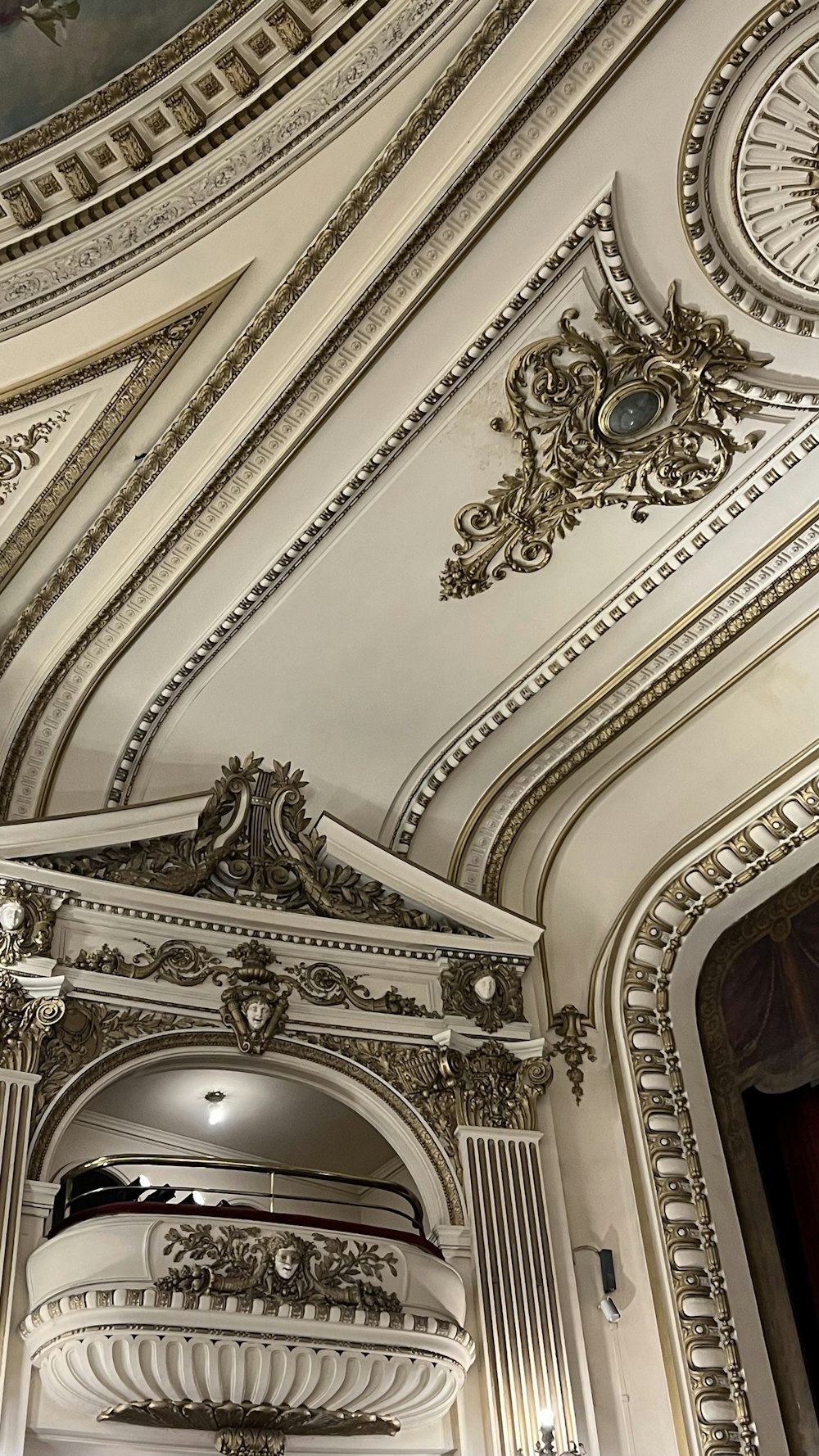 a ceiling with ornate decorations