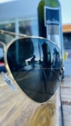 Close-up of trendy sunglasses on table