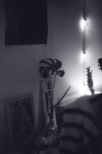 a guitar leaning against a wall