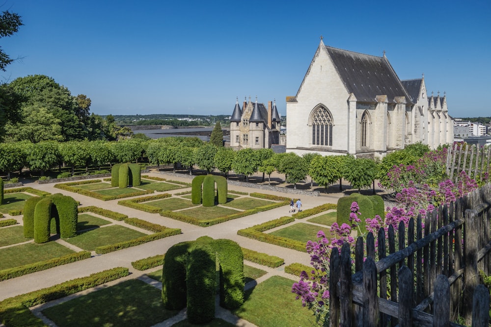 a garden in front of a church