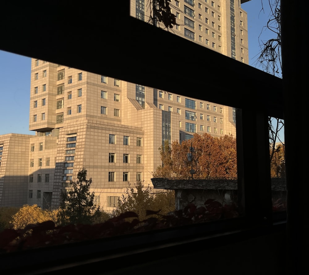 a building with trees in front of it