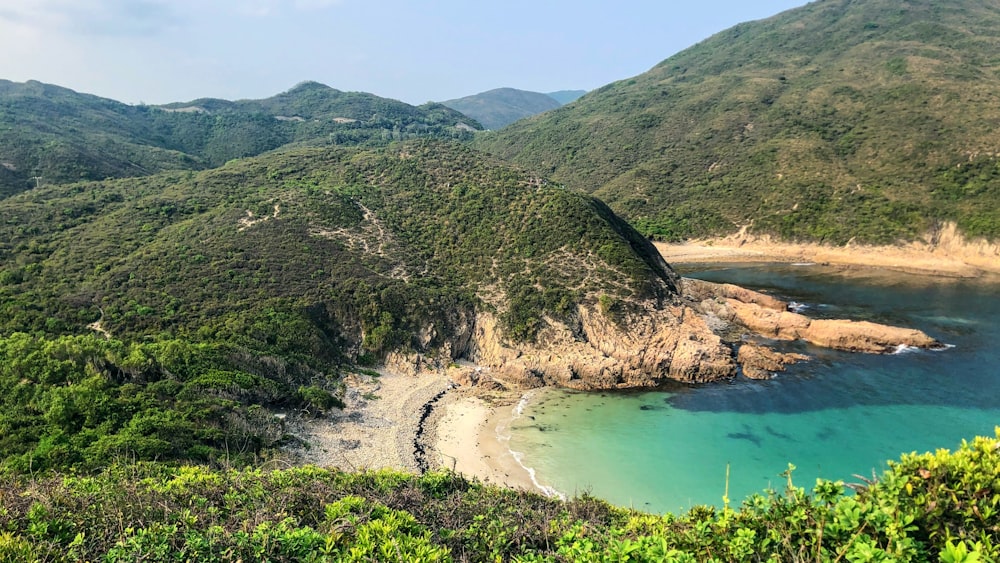 a beach and mountains