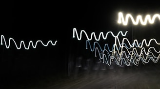 Abstract representation of quantum energy waves interacting in a cosmic background.