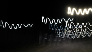 Abstract waves of light resembling the gentle pulse of a mother’s heartbeat