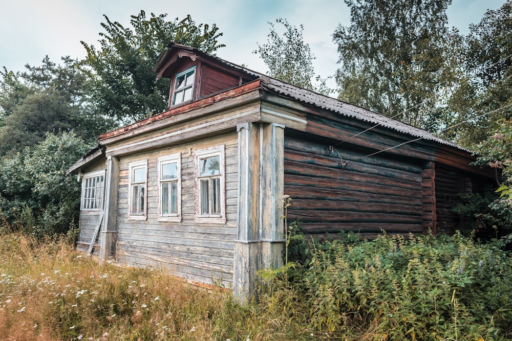 a wooden house in the woods