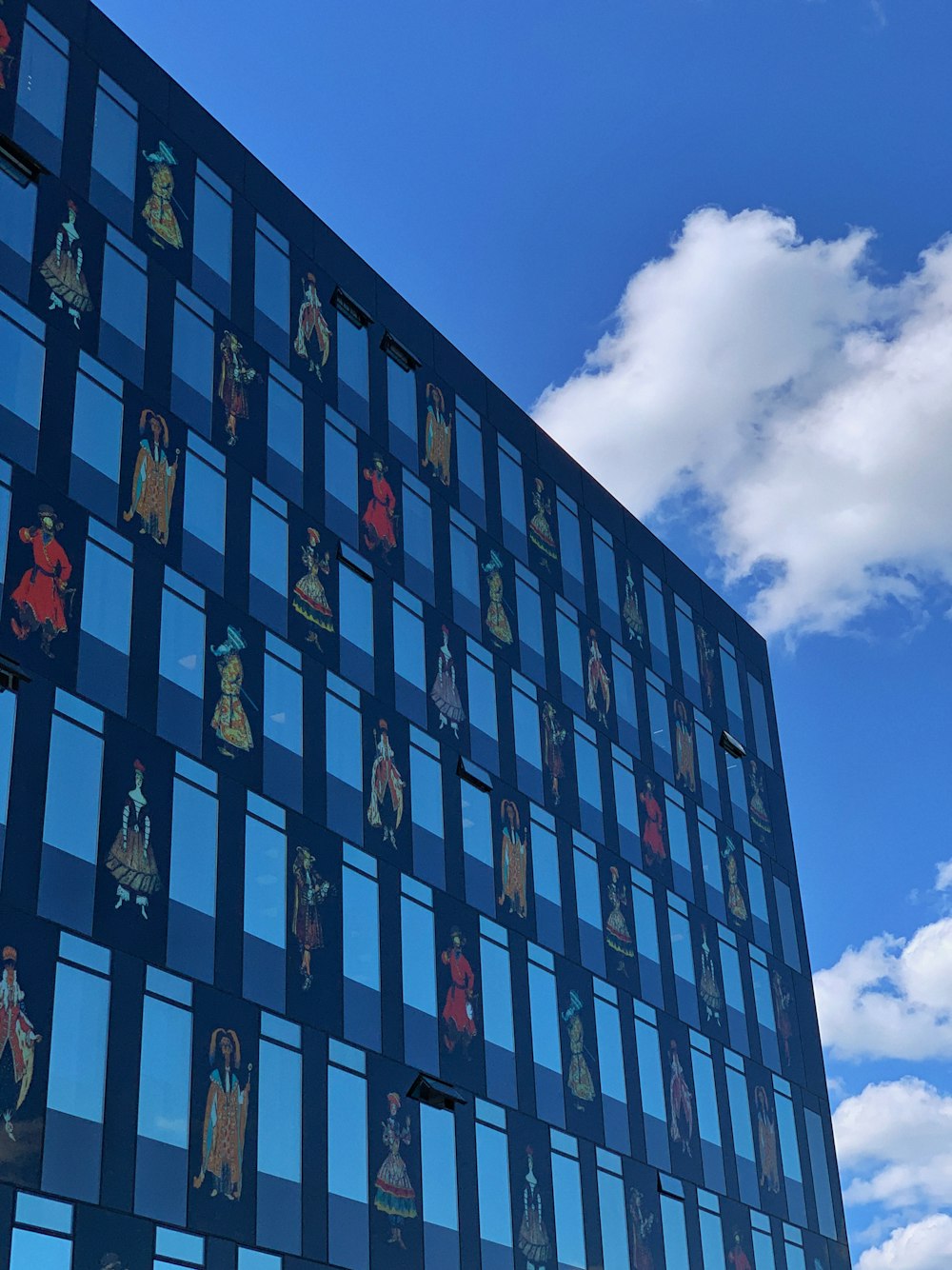 a building with many flags on it