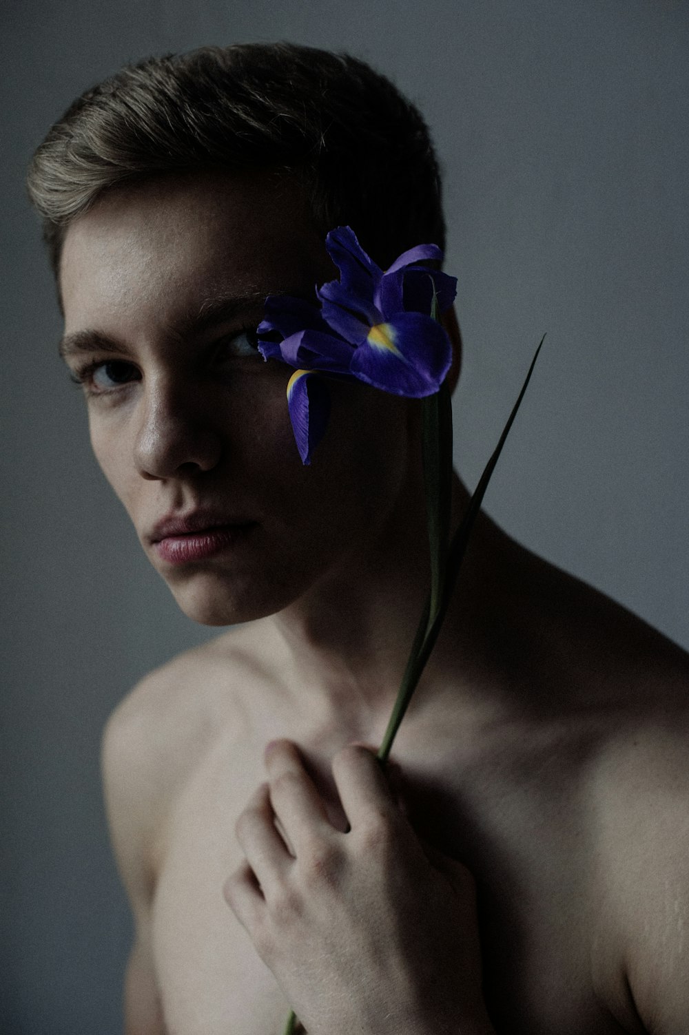 a person with a flower in the hair