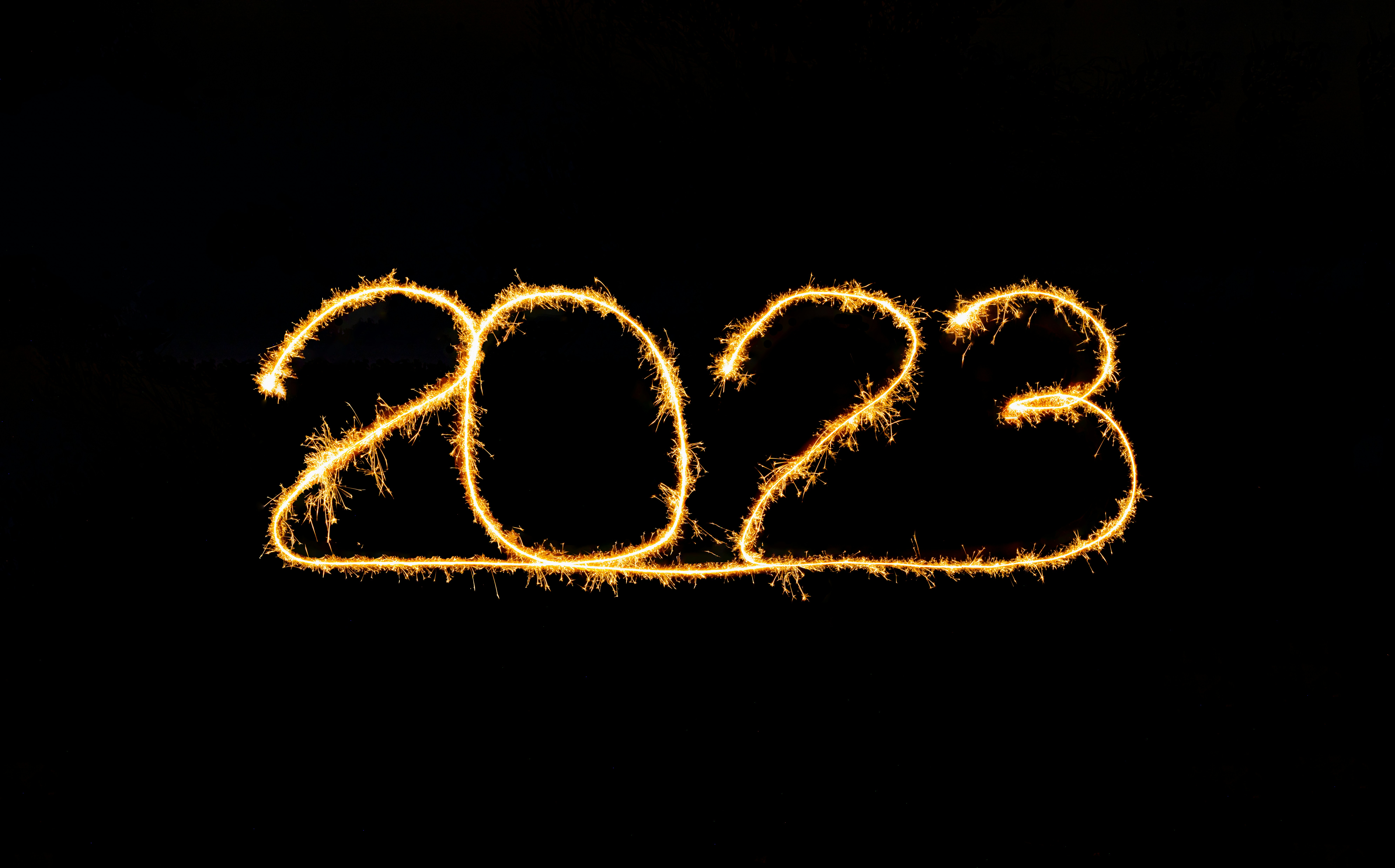 2023 lightpainted with sparklers, happy new year, 2023 banner for website, background for greeting cards, greetings