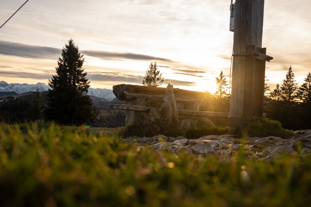 a stone structure in a field