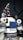 The image features a humanoid robot with mechanical arms and a screen on its chest. The robot has a sleek design with a combination of white, gray, and black colors. It appears to have multiple joints and components, giving it a complex, technical appearance.