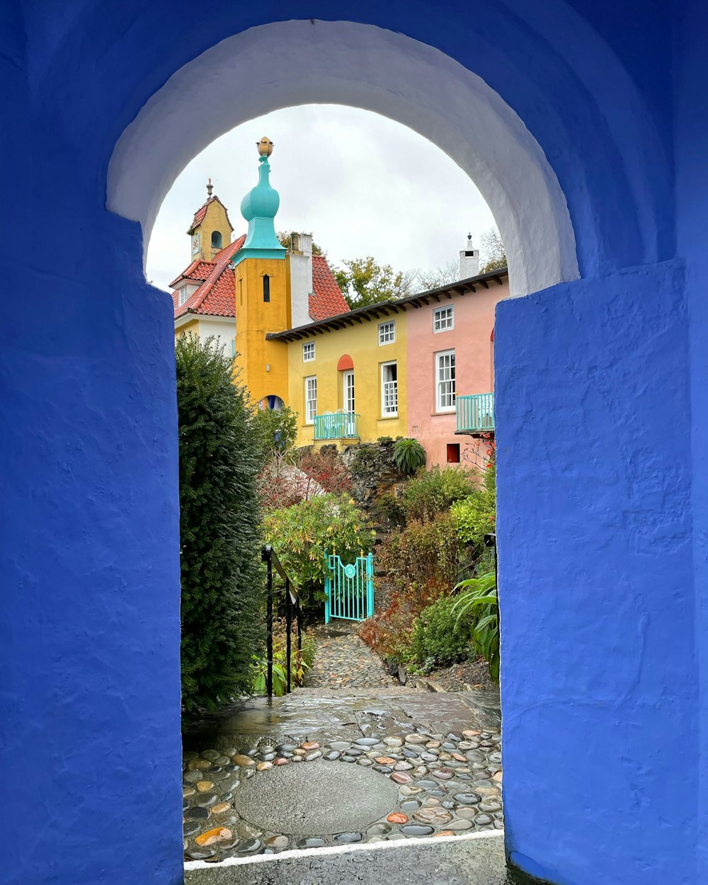 a stone walkway leading to a building