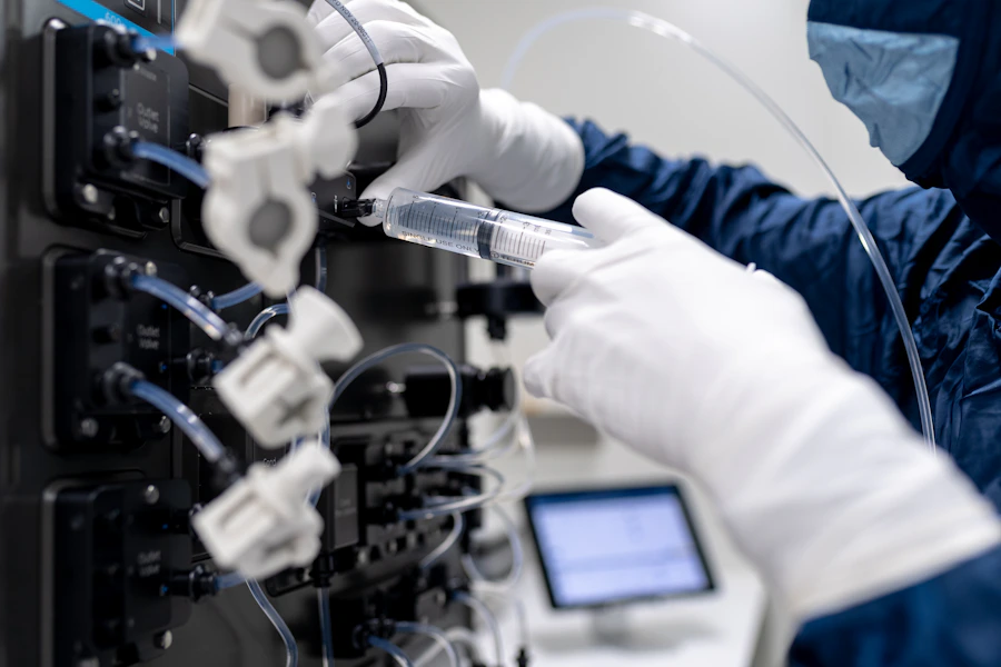 Laboratory technician working with scientific equipment