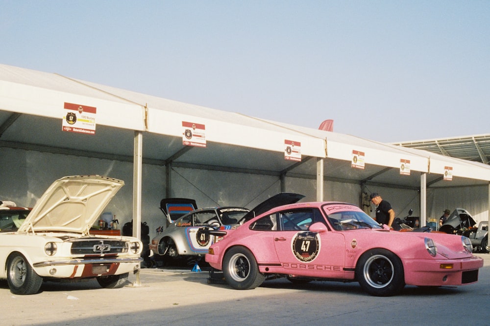 a group of cars parked outside a building