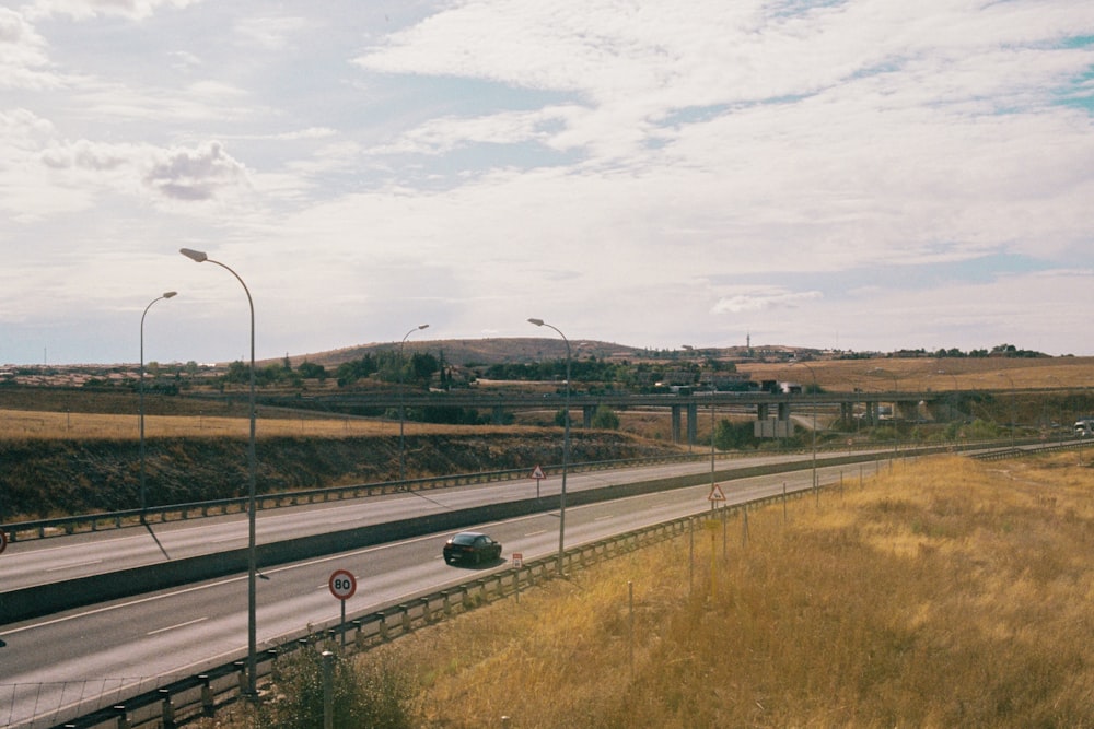 a car driving on a highway