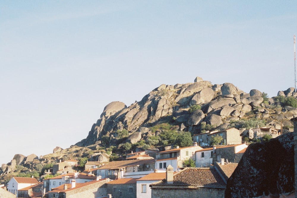 a hillside with buildings below