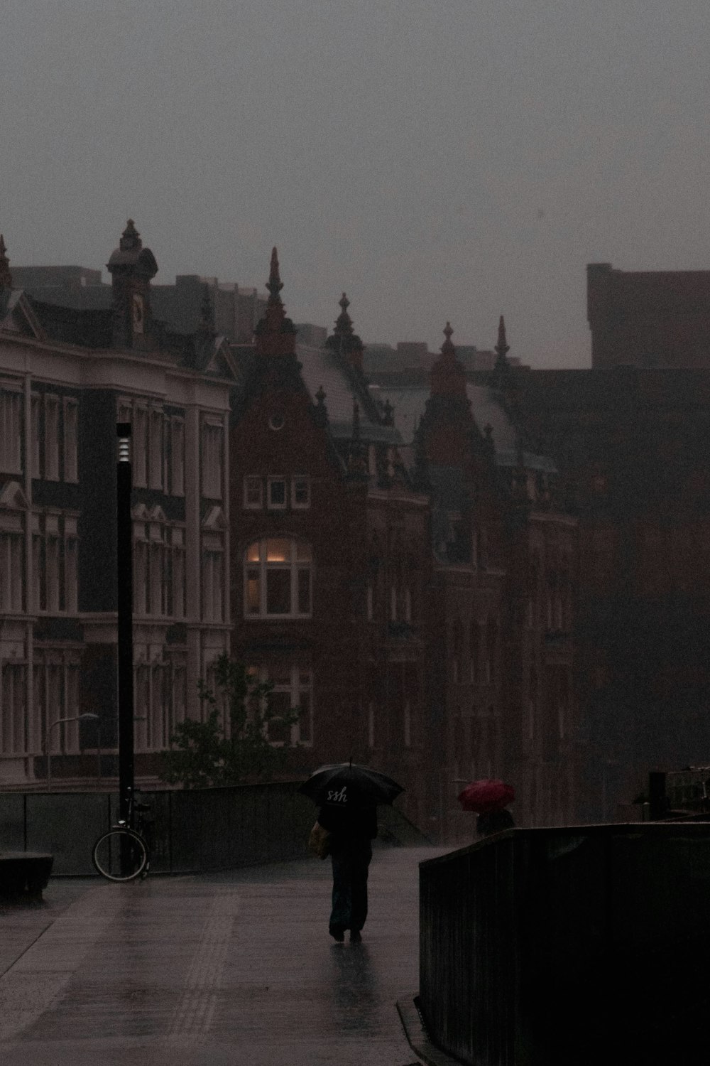 a person walking with an umbrella