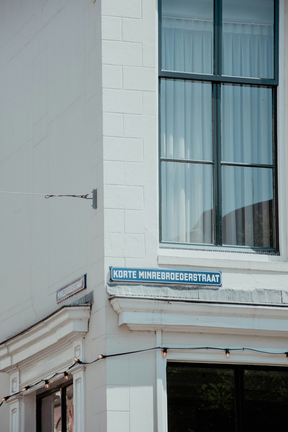 a street sign on the side of a building