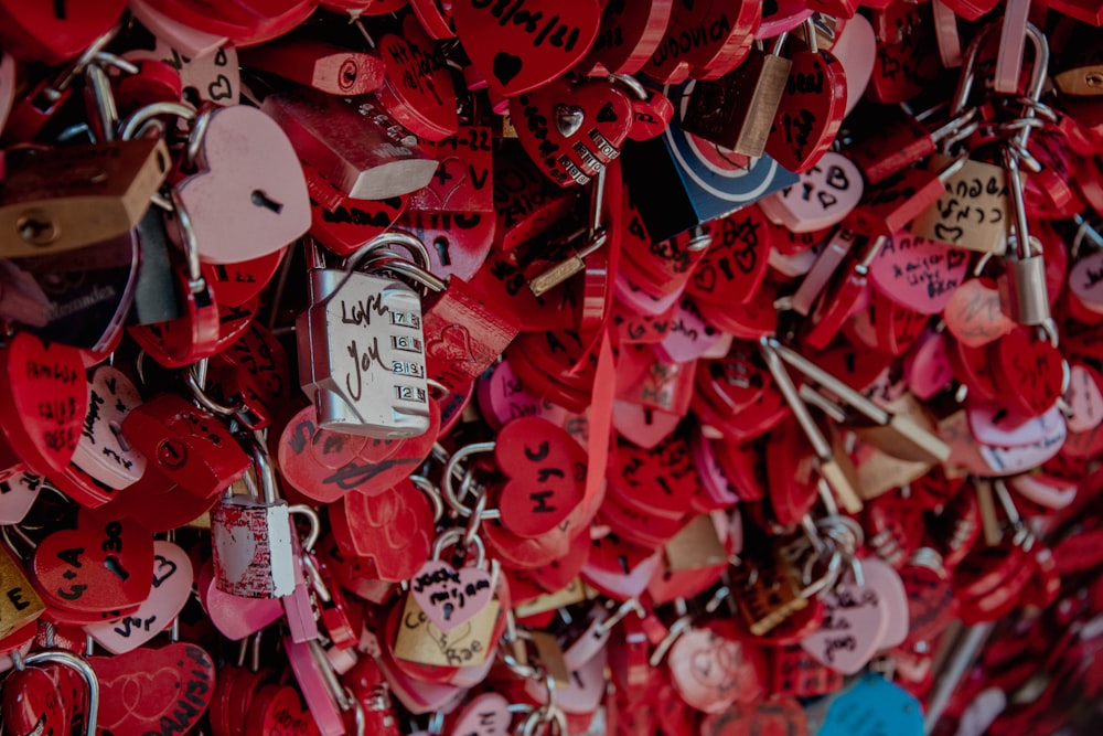 a pile of red and white heart shaped objects