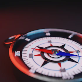 Close-up of a compass resting on a futuristic digital map symbolizing strategic navigation.