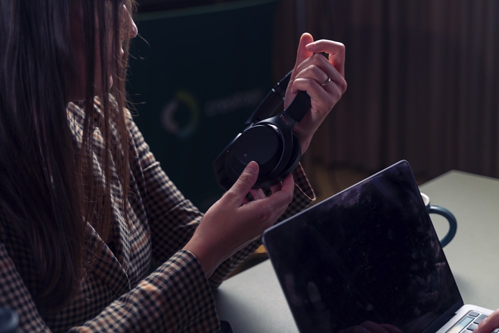 a woman holding a camera