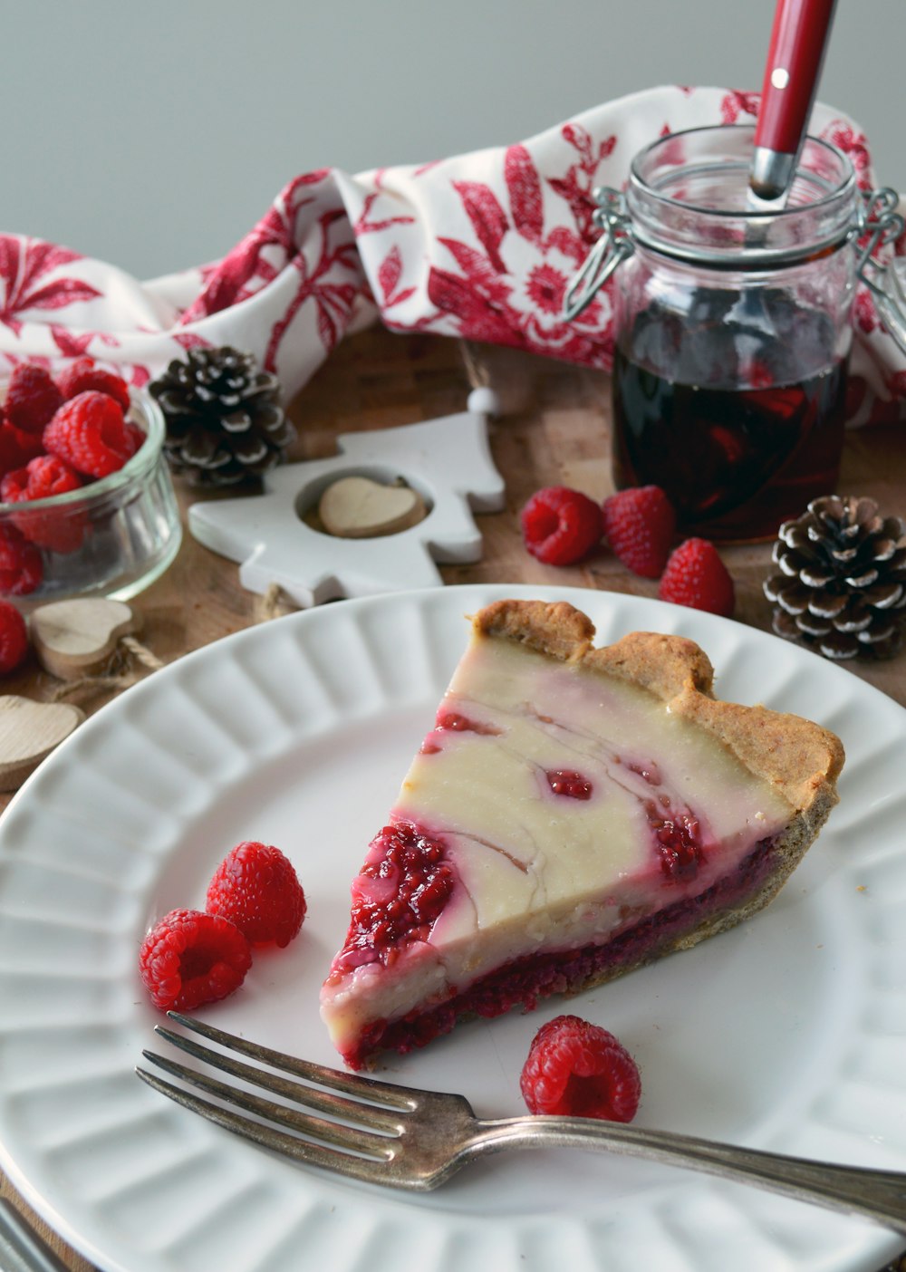 a piece of cake with strawberries on a plate