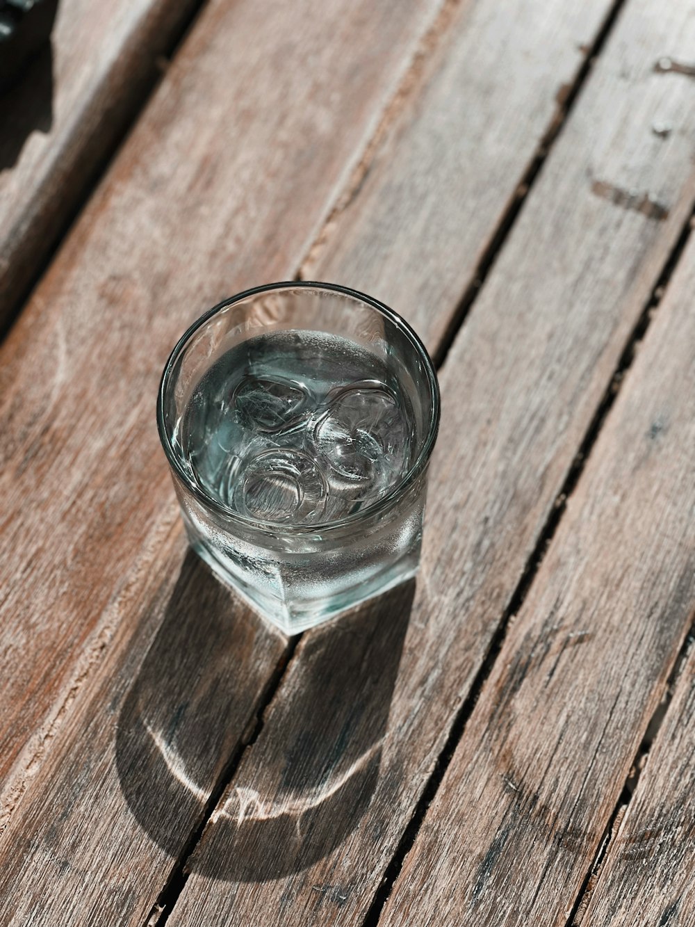 a glass of water on a table