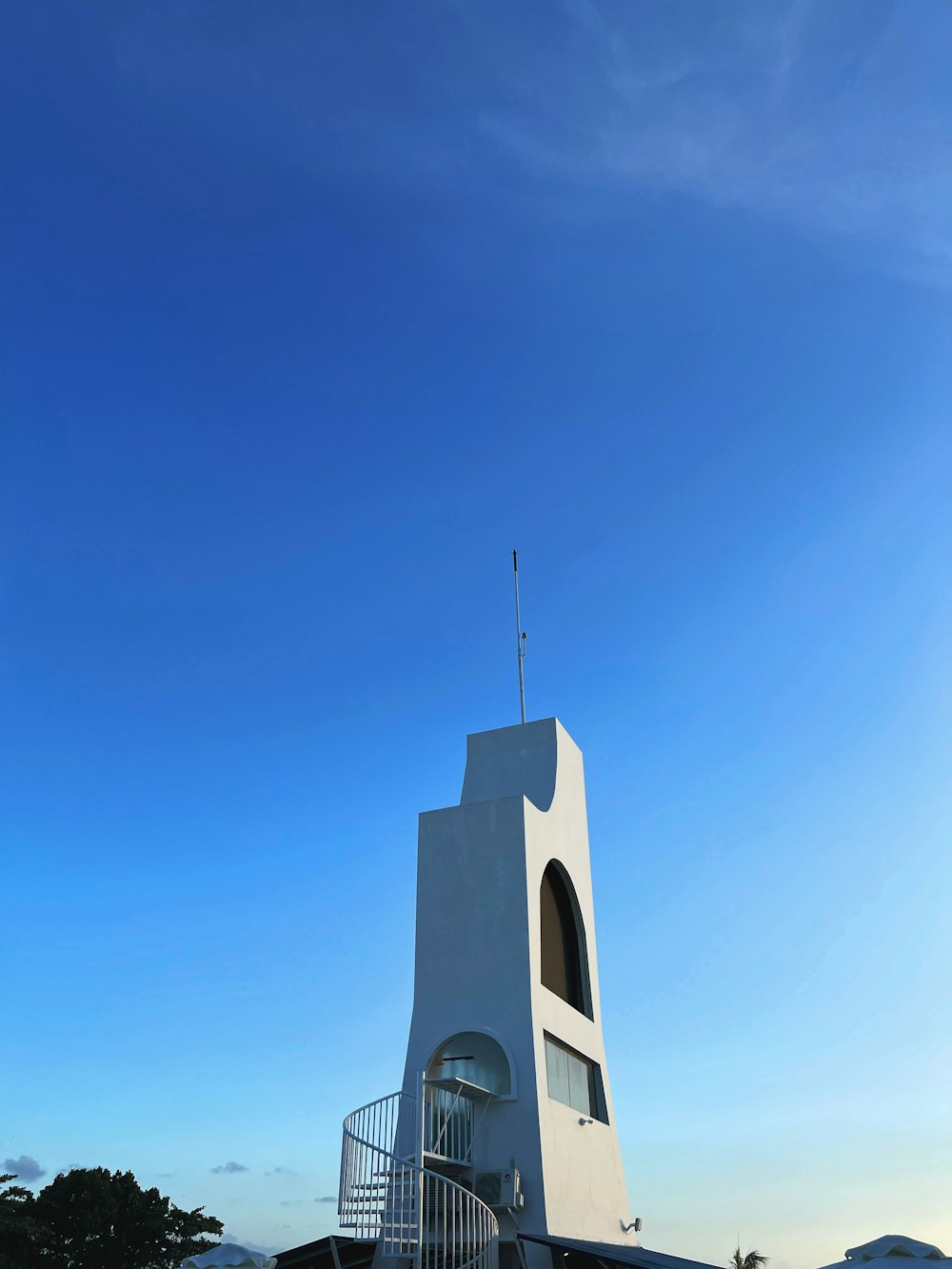 a white building with a tower