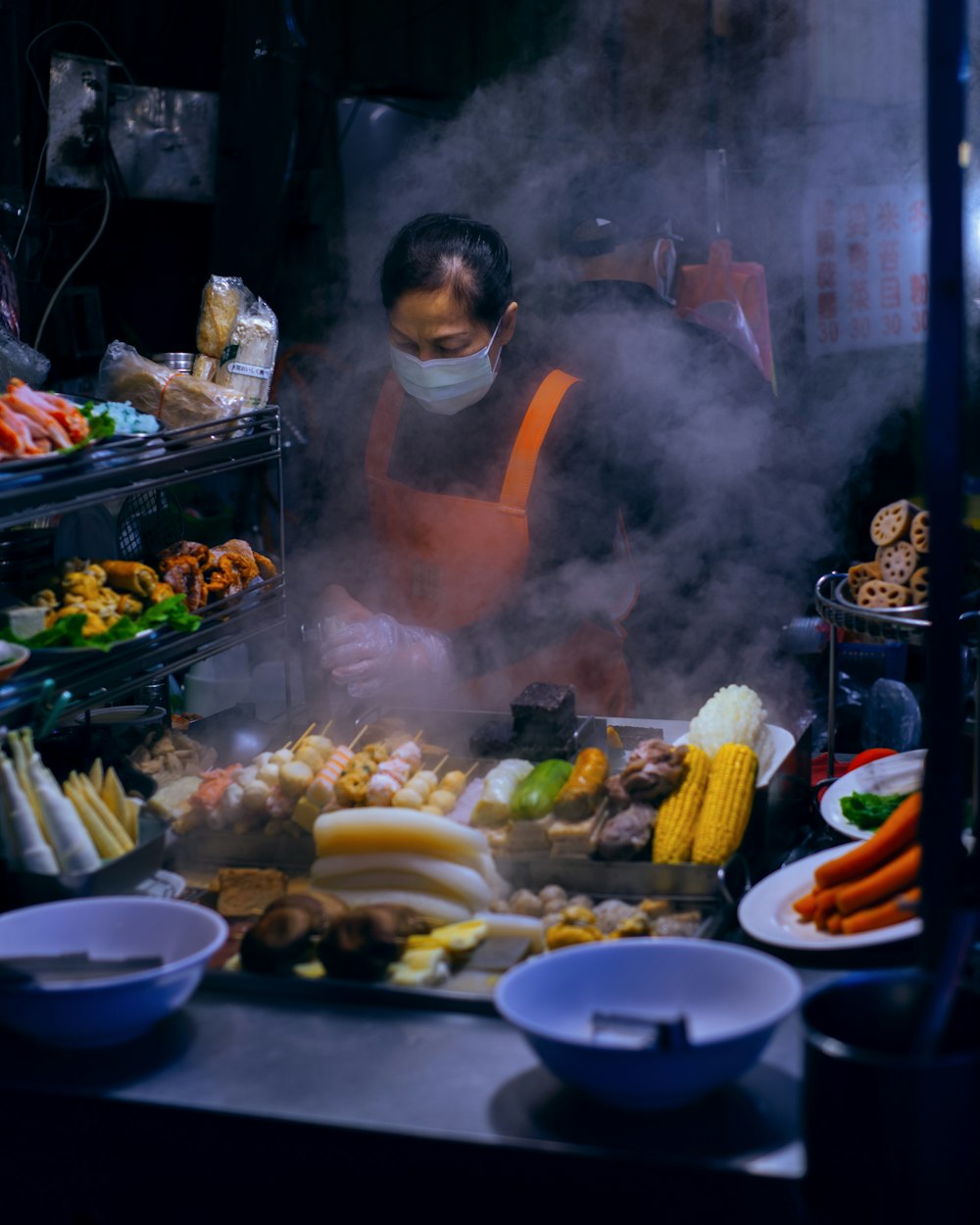 a person cooking food in a kitchen