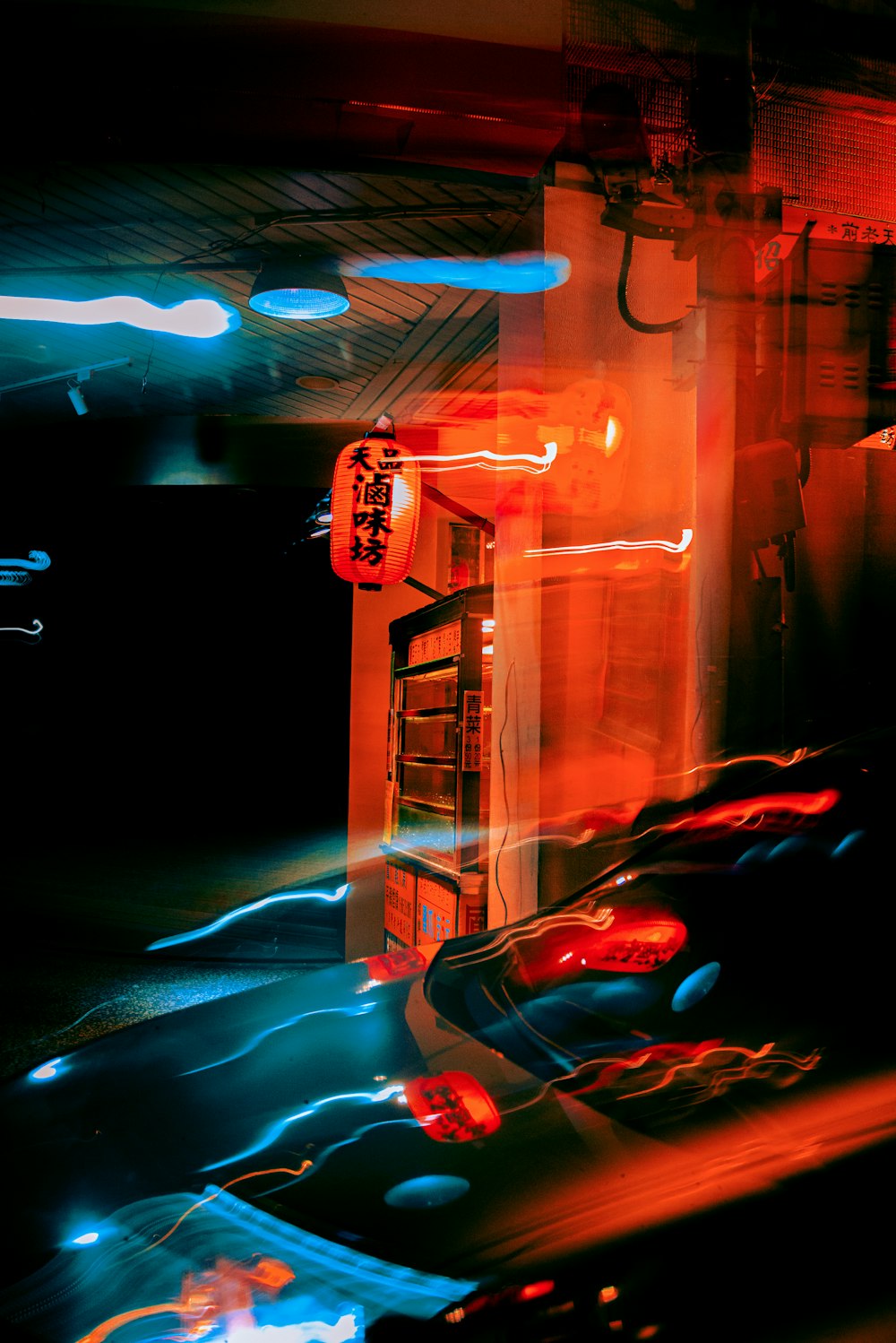 a soda machine in a dark room