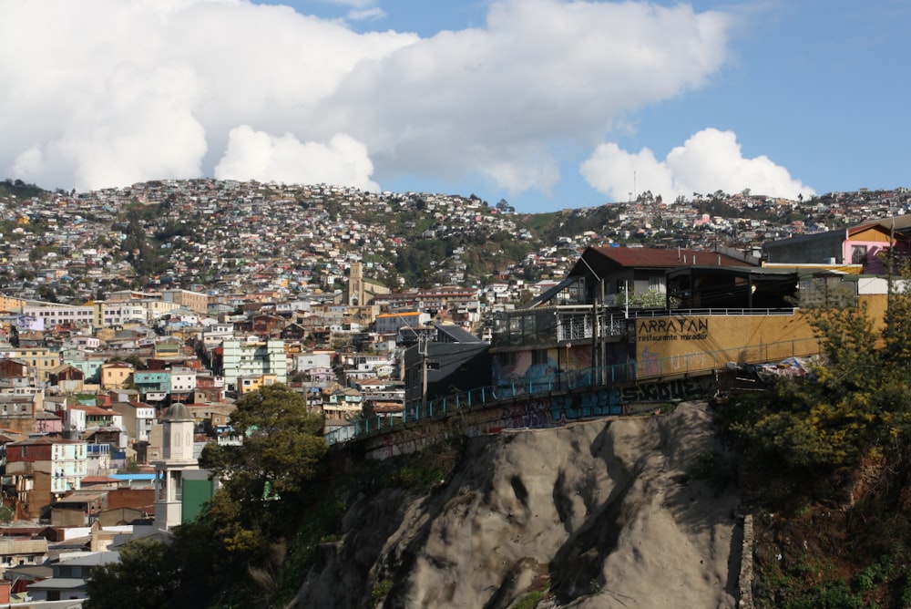 a city with a hill in the background