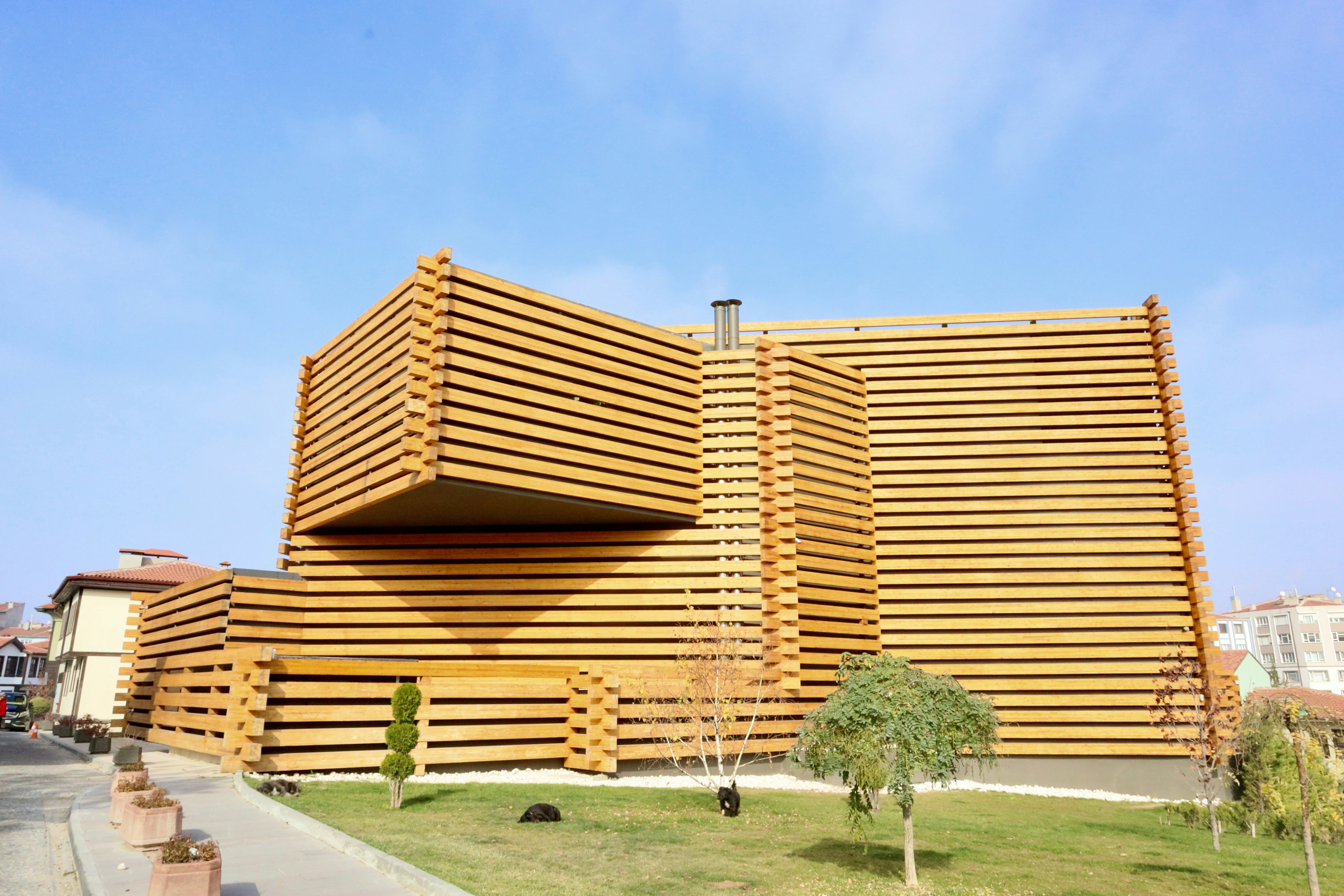 a building with a grass lawn