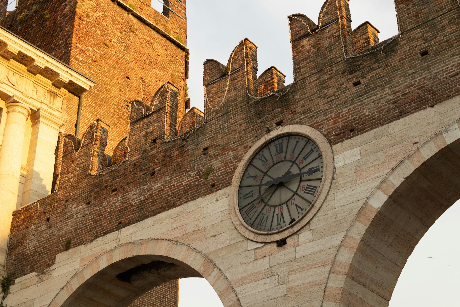 a clock on a brick building