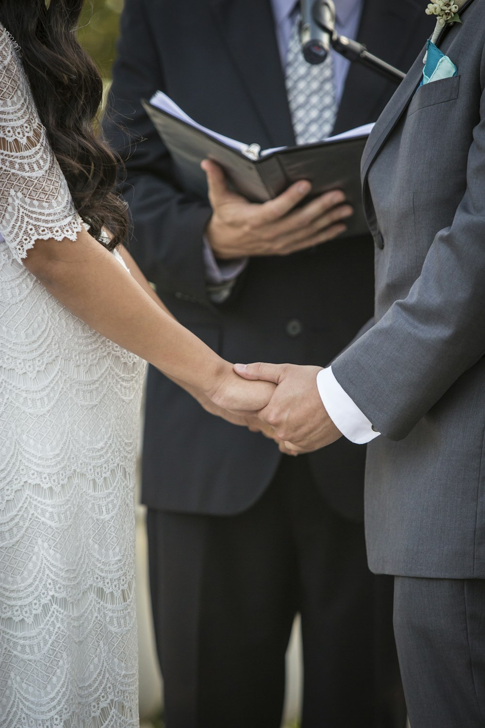 a man and woman holding hands