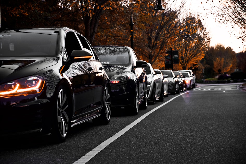 a row of cars on a road