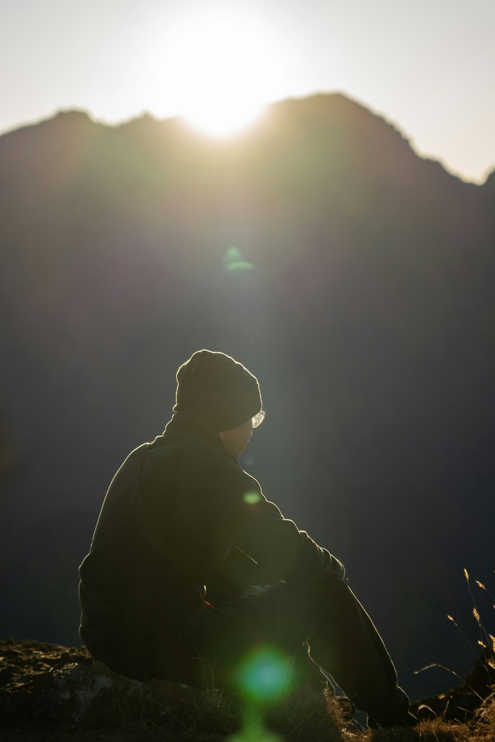 a person standing on a mountain