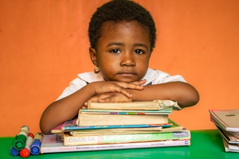 Child looking at multilingual books