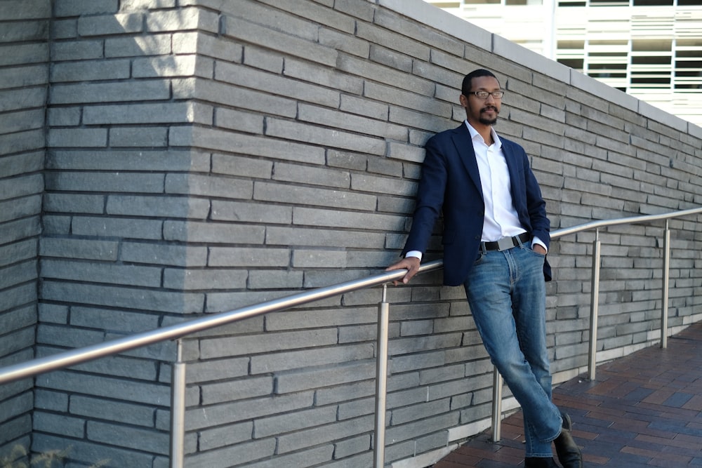 a person standing on a metal railing