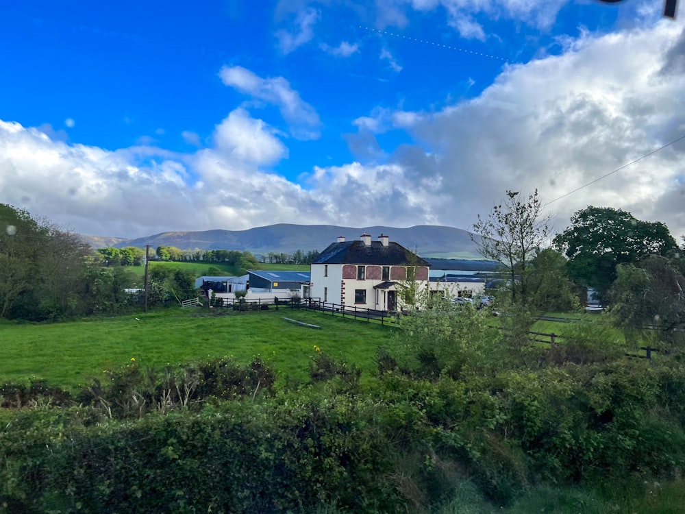 a group of houses in a field