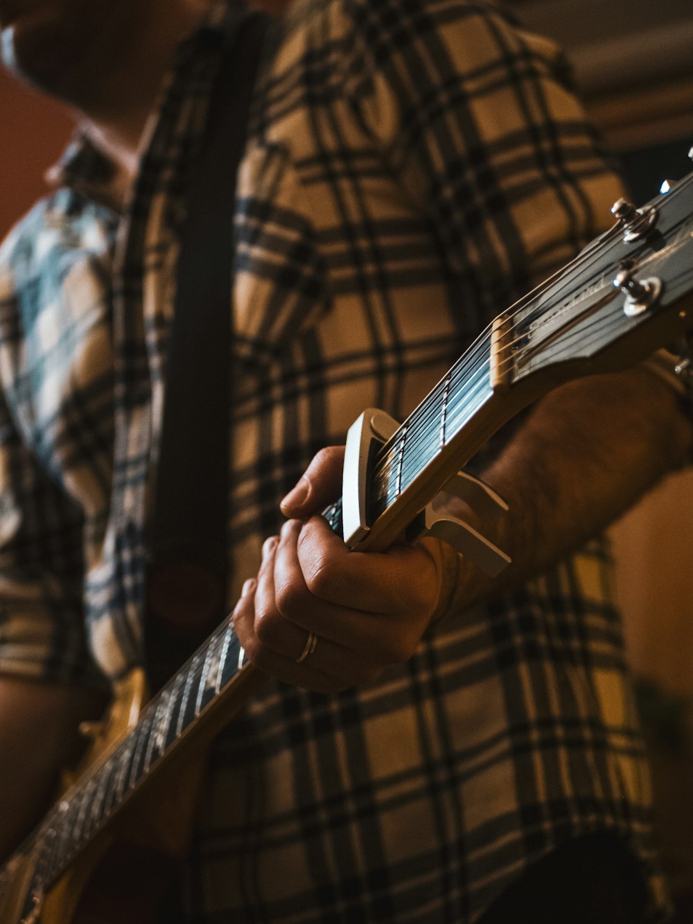 a person holding a guitar