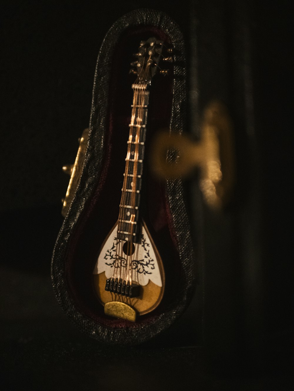 a guitar with a black background