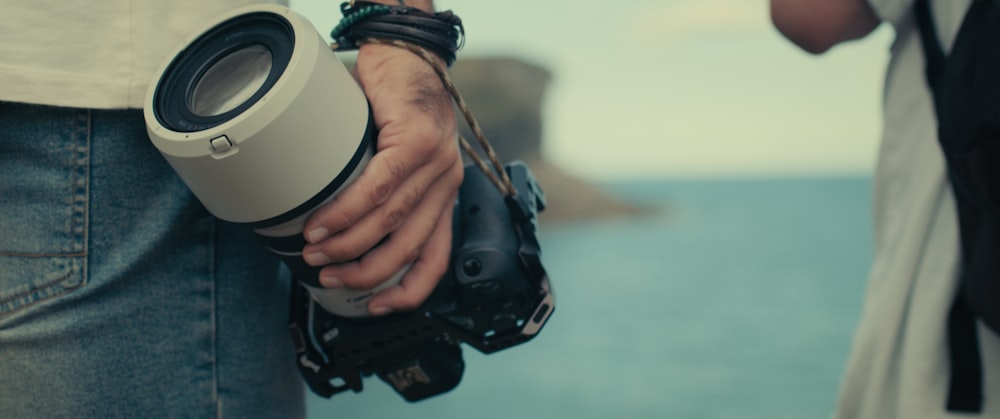 a person holding a camera