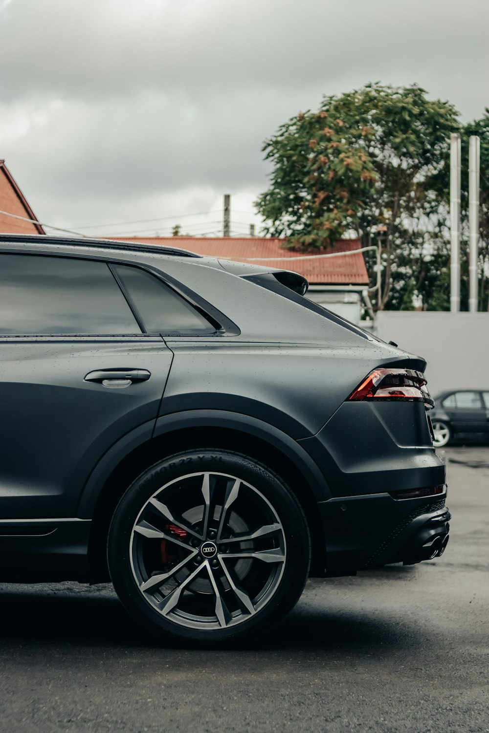 a black car parked on a street