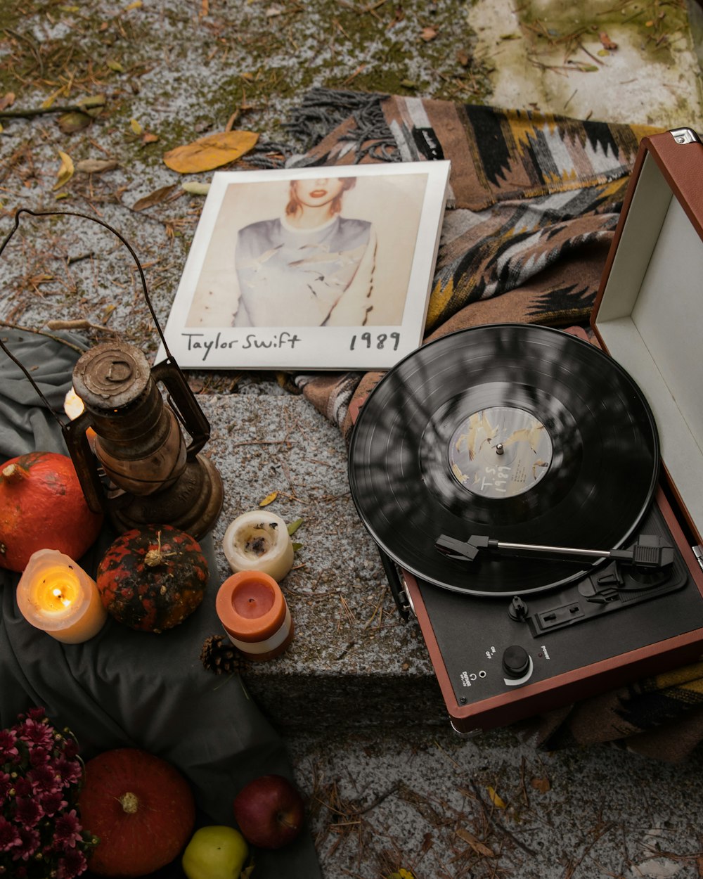 a picture frame and some fruit