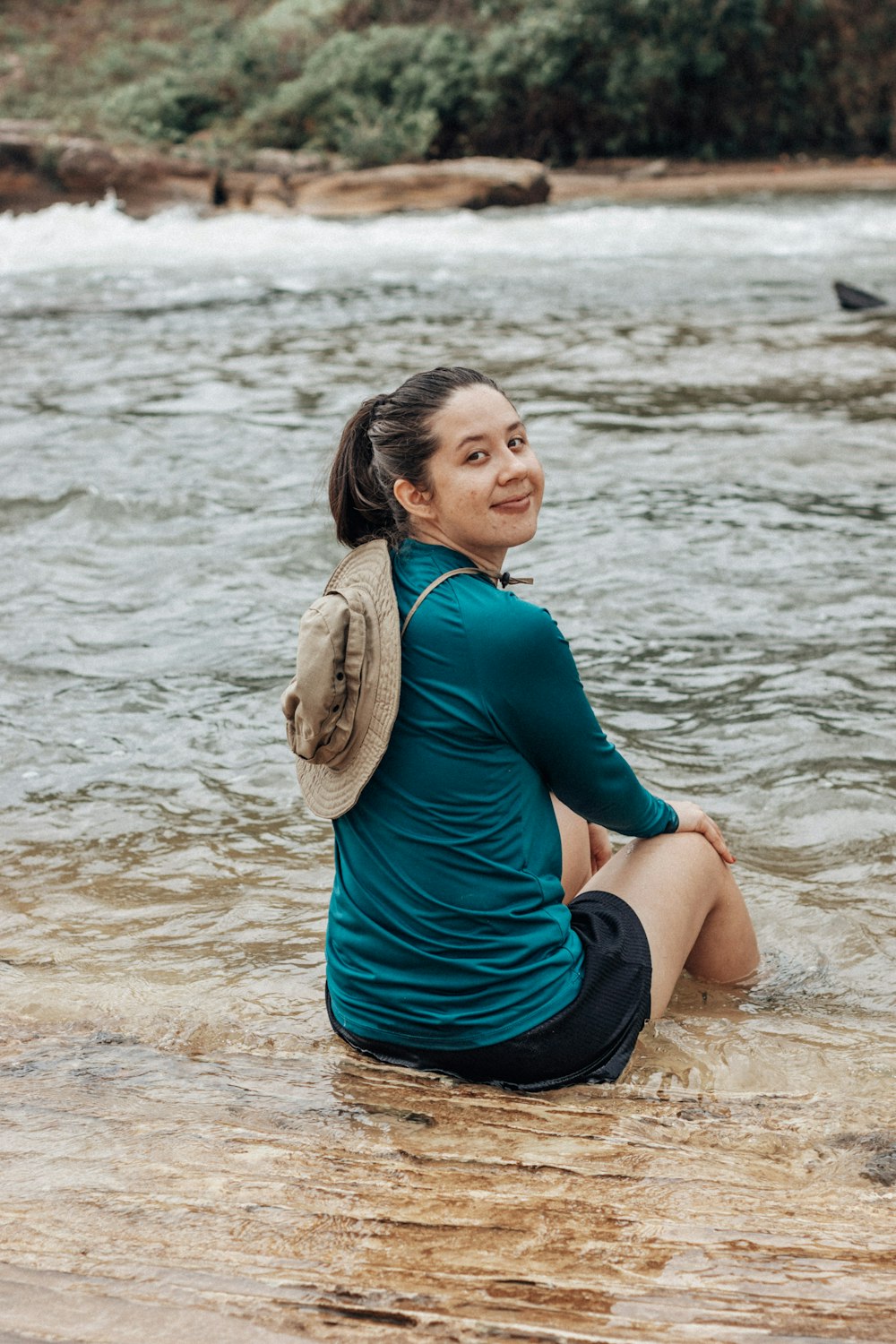 a person sitting in the water