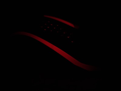 A sleek modern gadget with glowing LED lights on a dark surface